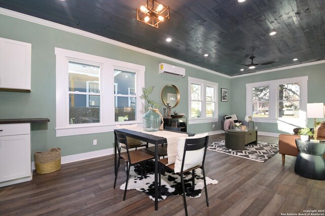 dining space featuring an AC wall unit, ornamental molding, dark wood-type flooring, and baseboards