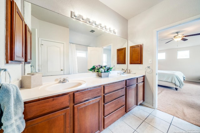 bathroom with ceiling fan, vanity, and tile patterned floors