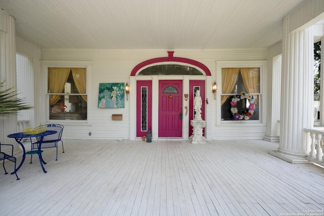 entrance to property with covered porch