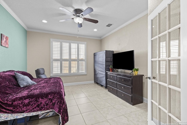 bedroom featuring light tile patterned floors, crown molding, and ceiling fan