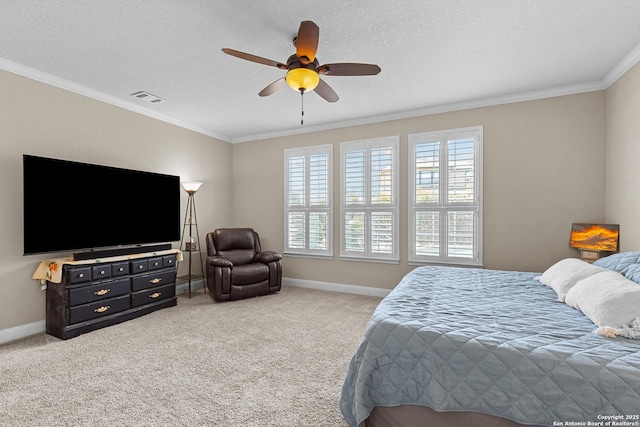 carpeted bedroom with crown molding, ceiling fan, and a textured ceiling