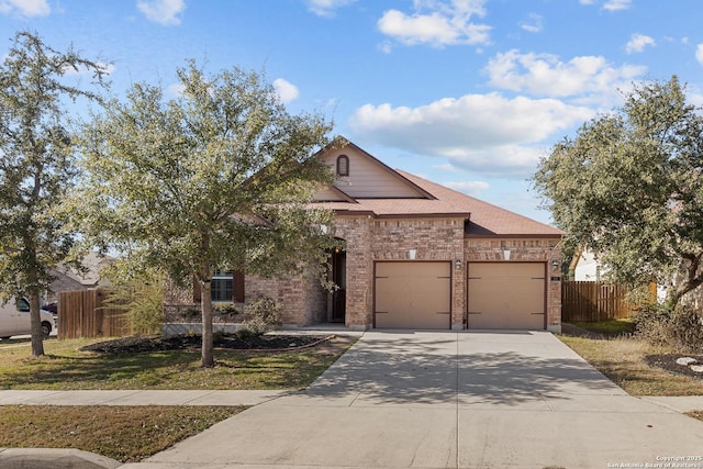 view of front of home with a garage