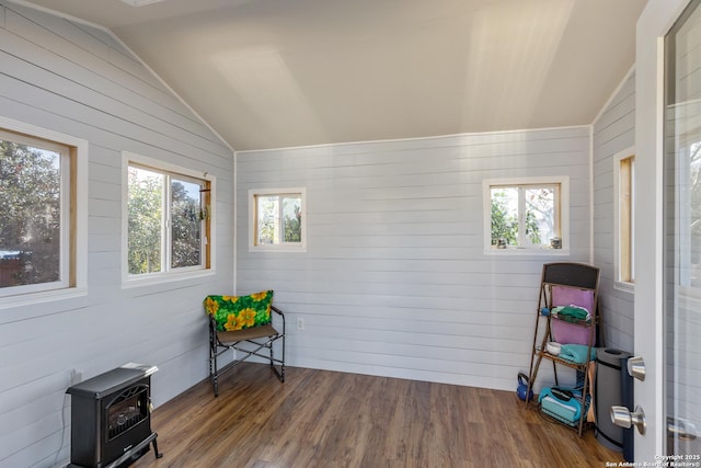 sunroom with lofted ceiling and a wealth of natural light