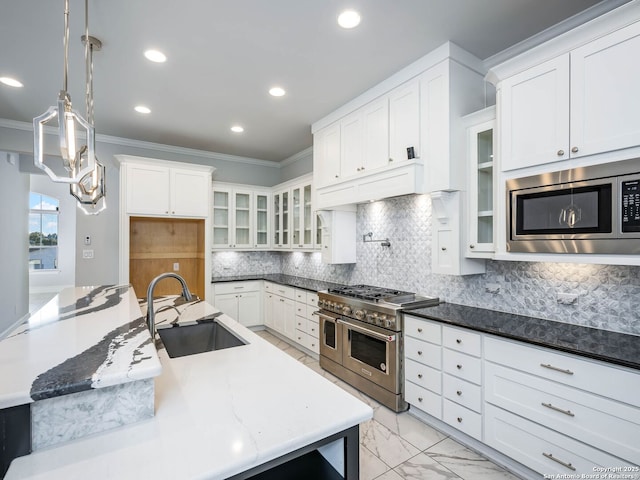 kitchen with sink, crown molding, hanging light fixtures, stainless steel appliances, and white cabinets