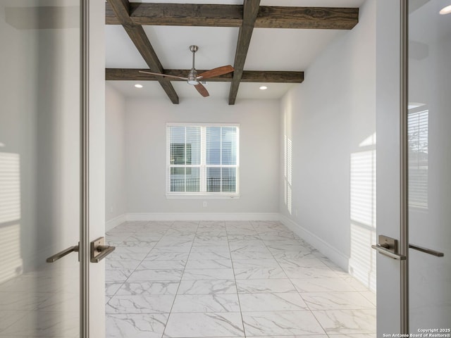 unfurnished room with coffered ceiling, ceiling fan, and beamed ceiling