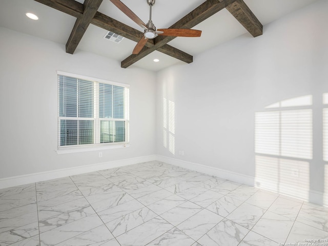 empty room with ceiling fan and beam ceiling