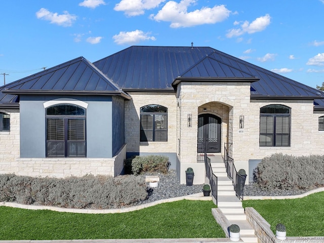 view of front facade with a front lawn