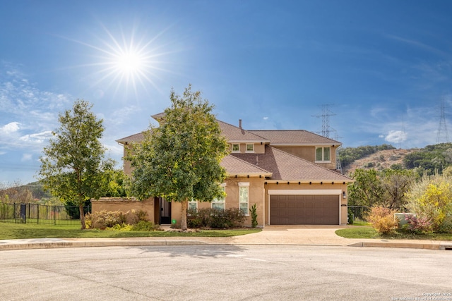 view of front of property featuring a garage