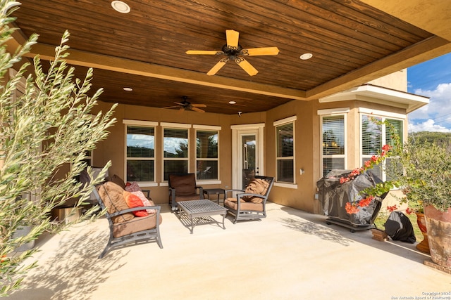 view of patio with ceiling fan and grilling area