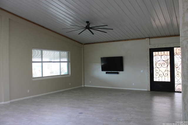 entryway with ceiling fan and vaulted ceiling