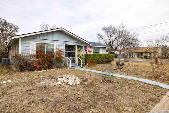 view of front of house featuring central air condition unit