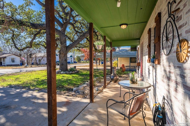 view of patio featuring a porch