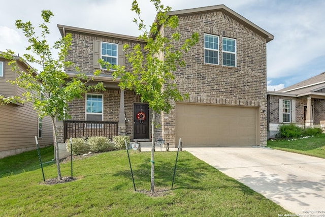 view of front of property with a garage, a front lawn, and a porch