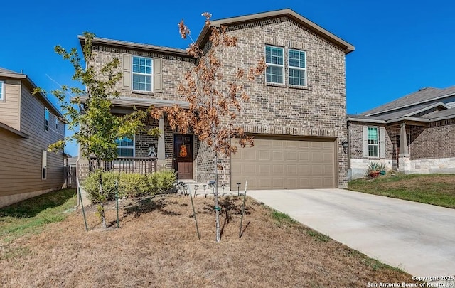 view of front of property featuring a garage