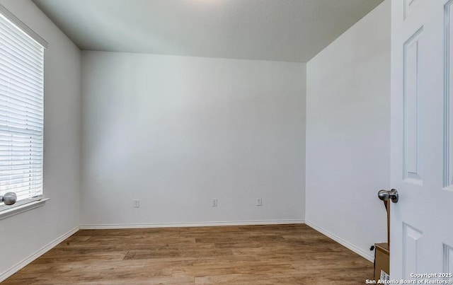 empty room featuring light hardwood / wood-style flooring