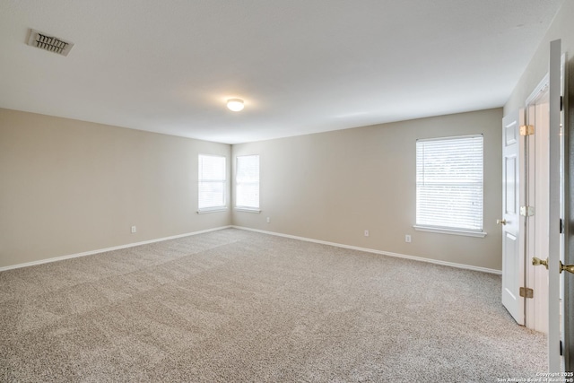 view of carpeted spare room