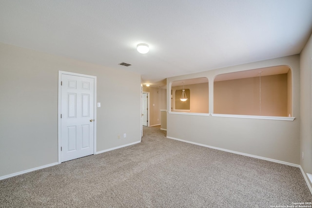 view of carpeted spare room