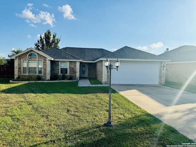 ranch-style house with a garage and a front yard