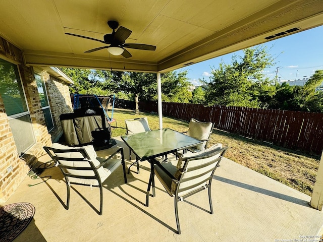 view of patio with ceiling fan