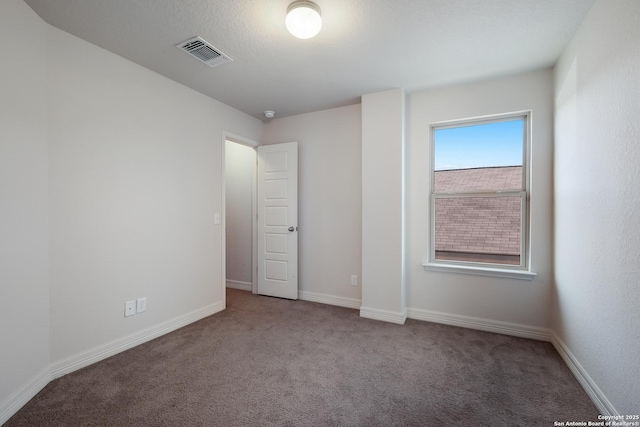 empty room featuring carpet