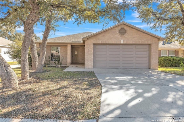 ranch-style house featuring a garage