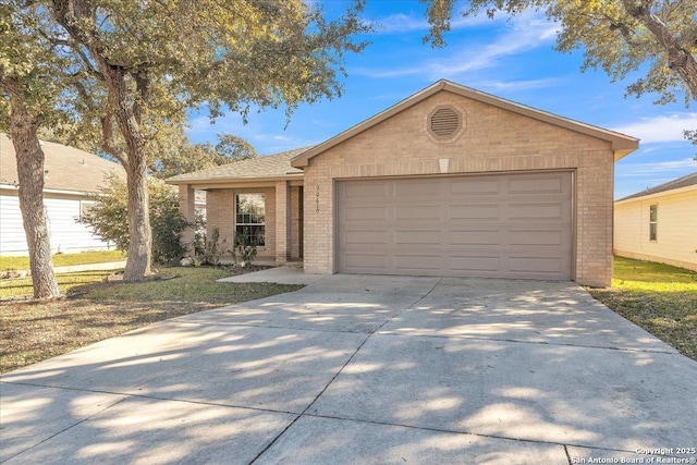 single story home featuring a garage