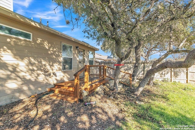 view of yard featuring a wooden deck