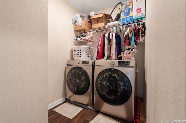 washroom with wood-type flooring and separate washer and dryer