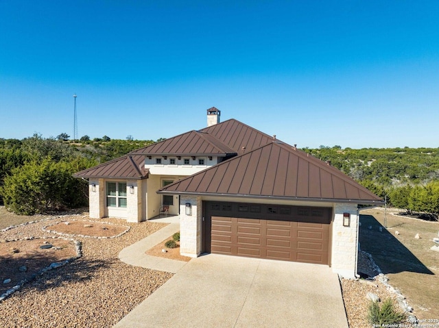 view of front of property featuring a garage