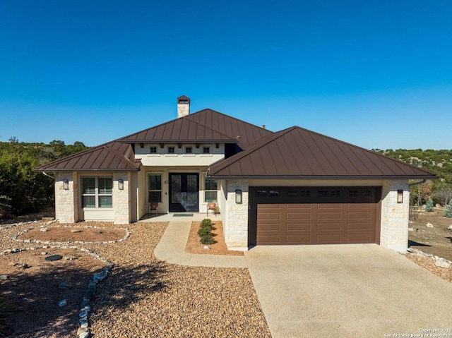 view of front of property with a garage