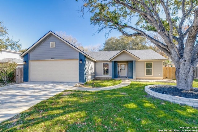 ranch-style home with a garage and a front yard