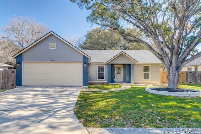 single story home featuring a garage and a front lawn