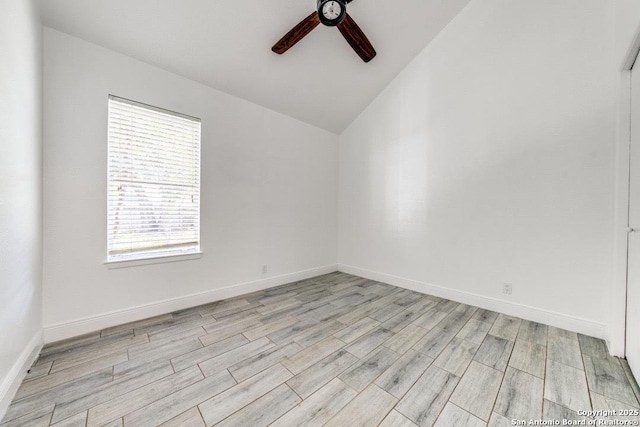 unfurnished room featuring vaulted ceiling, light hardwood / wood-style floors, and ceiling fan