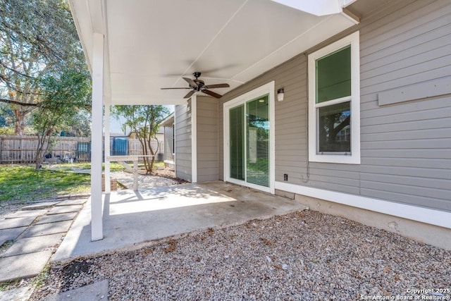 view of patio featuring ceiling fan