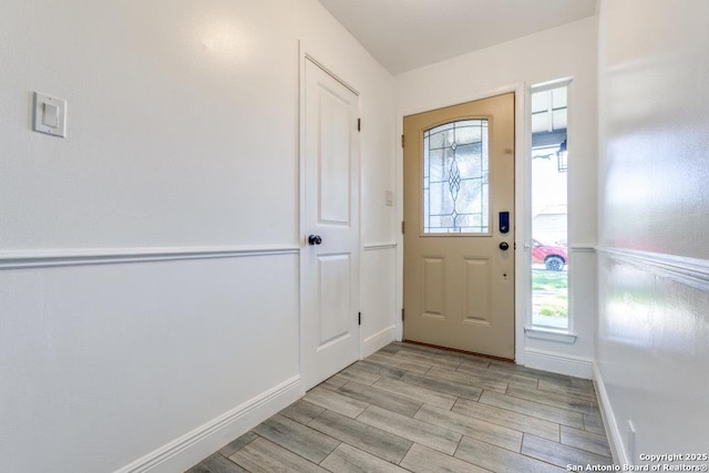 entrance foyer with light wood-type flooring