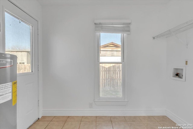 1641 Post Rd, New Braunfels, TX 78130 - laundry area with washer hookup, light tile patterned floors, and water heater