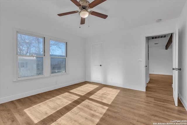 1641 Post Rd, New Braunfels, TX 78130 - unfurnished bedroom featuring ceiling fan and light hardwood / wood-style floors