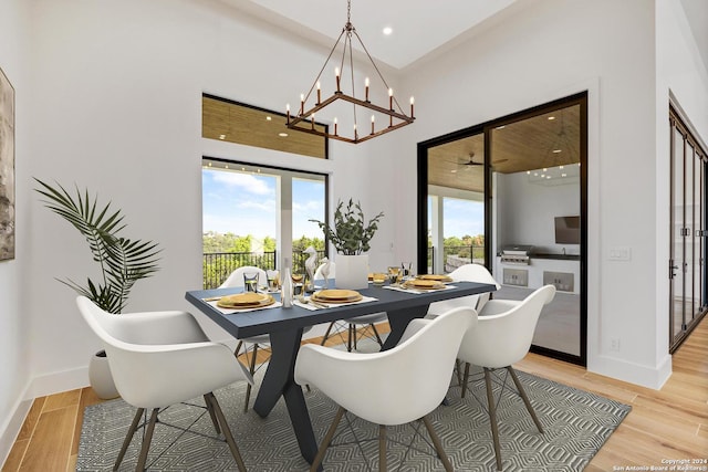 dining space featuring plenty of natural light and light hardwood / wood-style floors