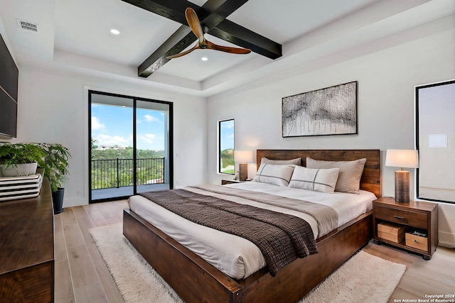 bedroom featuring beamed ceiling, ceiling fan, and access to outside