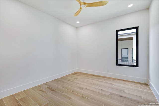 unfurnished room with light hardwood / wood-style floors and ceiling fan