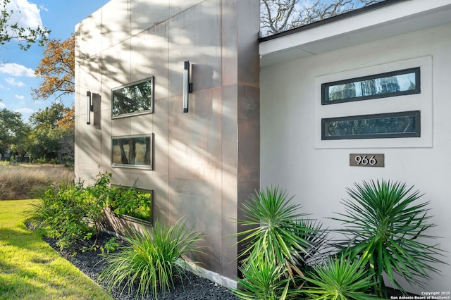 view of side of property featuring stucco siding