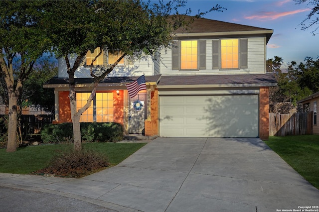 view of front of property with a garage