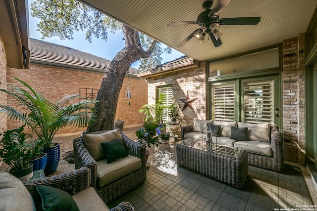 view of patio with ceiling fan and an outdoor hangout area