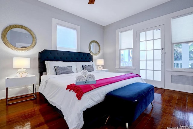 bedroom featuring wood-type flooring and ceiling fan