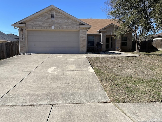 single story home with a garage