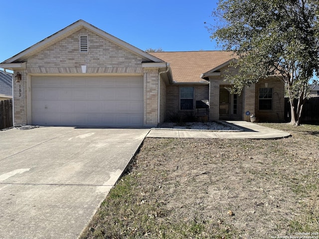 ranch-style home featuring a garage