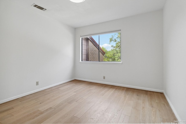 12519 Elm Manor St, San Antonio, TX 78230 - empty room featuring light wood-style floors and baseboards