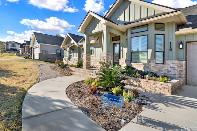 exterior space featuring a porch and a garage