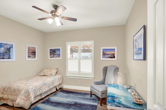 bedroom with wood-type flooring and ceiling fan