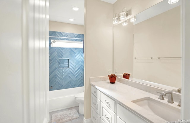 full bathroom with tile patterned flooring, vanity, bathing tub / shower combination, and toilet